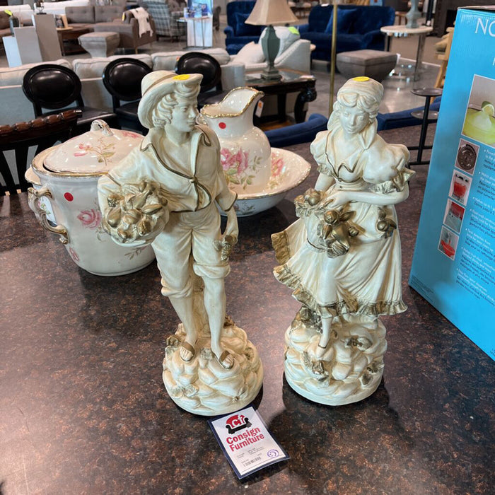 Pair of Cream Stone Statues