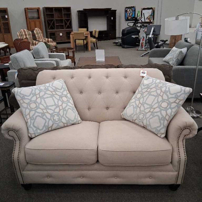 Beige Tufted Loveseat