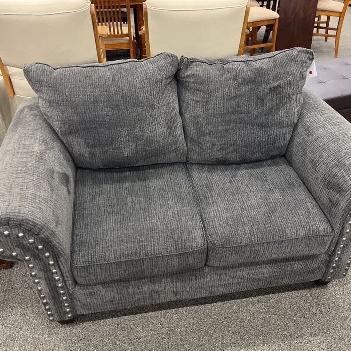 Gray Loveseat w/ Nailheads