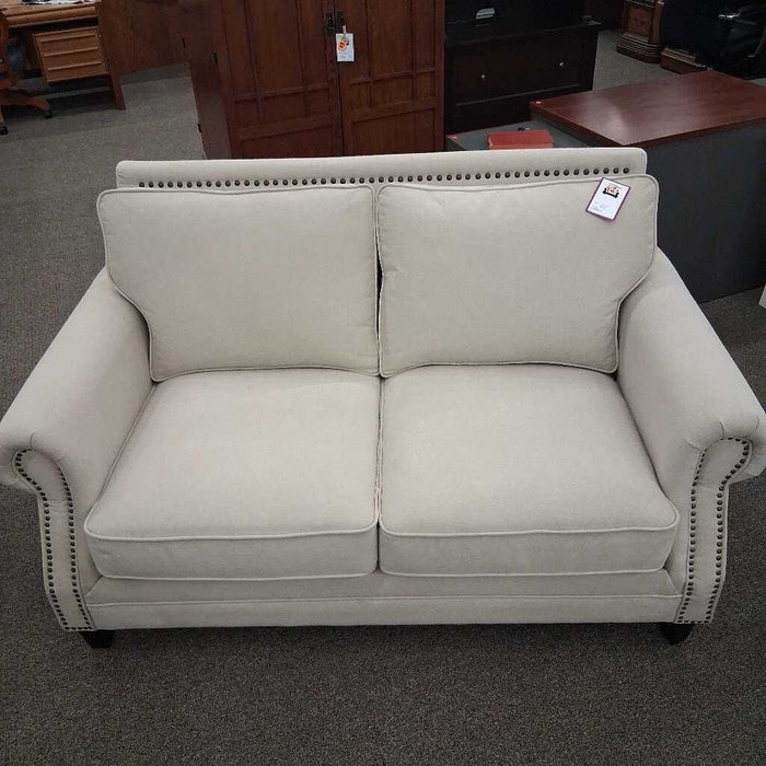 Beige Uph. Loveseat w/ Nailheads