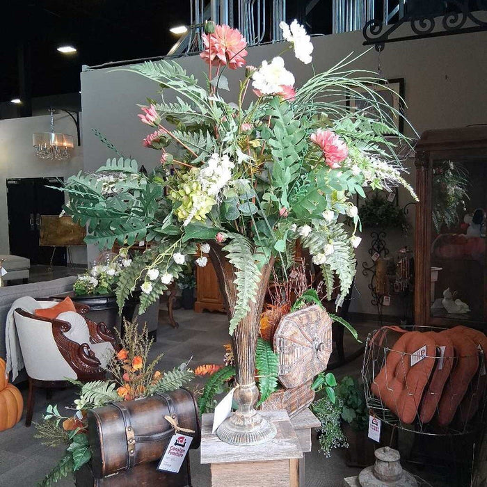 Large Floral In Tall Rusted Vase
