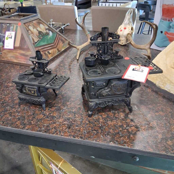 Pair of Miniature Cast Iron Stoves