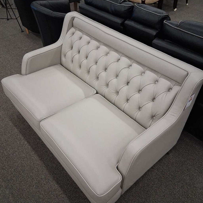 Gray Tufted Loveseat