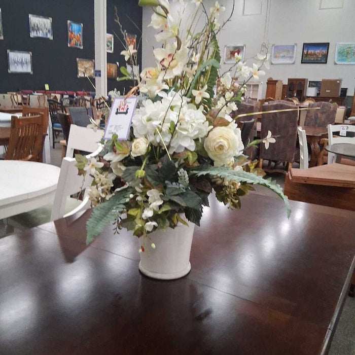 White Faux Flowers in Cream Ceramic Vase