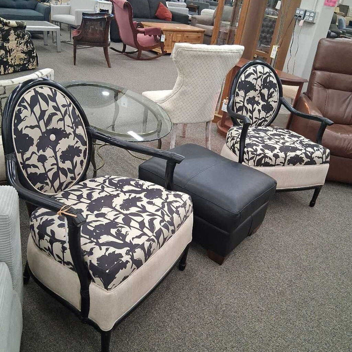 Pair of Black Chairs w/ Beige Pattern Cusions