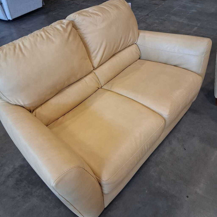 Small Cream Color Loveseat