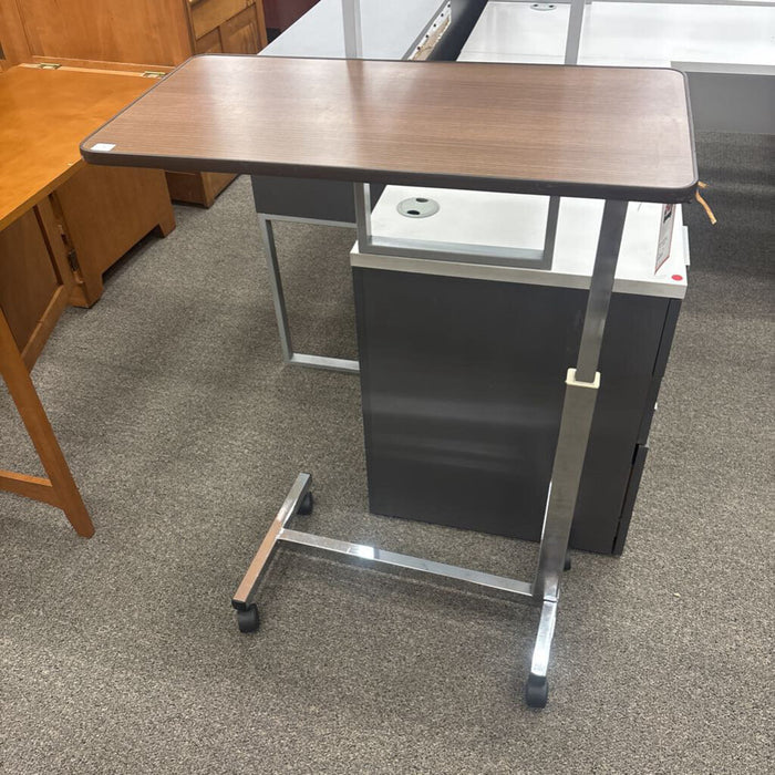Adj. Tray Table on Castors