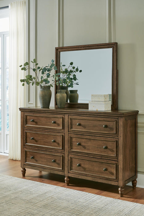 Sturlayne California King Upholstered Panel Bed, Dresser, Mirror, Chest and Nightstand